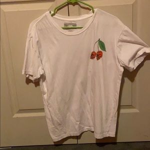 White shirt with cherry skulls.